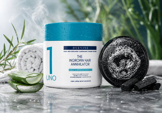HueVine The Ingrown Hair Annihilator exfoliating bar with aloe vera, activated charcoal, and spa-inspired skincare styling.