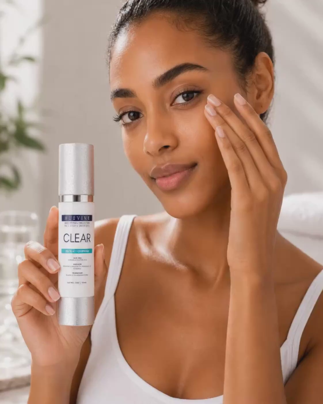 Video demonstration of HueVine Clear Brightening Serum being applied during a skincare routine.