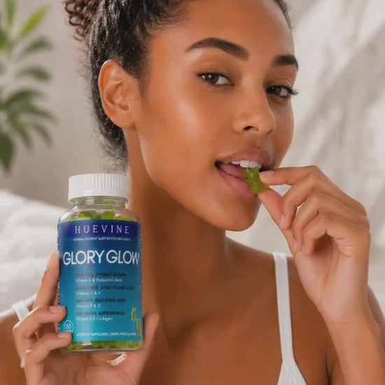 Video demonstration of a woman taking HueVine Glory Glow vitamin gummies as part of a daily wellness routine.